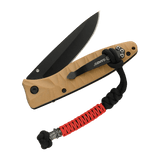 M-Tac Ninja Ver.2 Lanyard med paracord 550 og ninja-motiv fastgjort til en kniv. Stilfuldt tilbehør til løfteknive, lygter og små genstande.