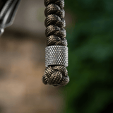 M-Tac Viper Lanyard Stainless Steel med flettede paracord og rustfrit stål Viper-perle for nem adgang til kniv.