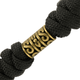 Nærbillede af M-Tac Zeus Lanyard med flettet paracord og stilfuldt design, ideel til kniv og udstyr.