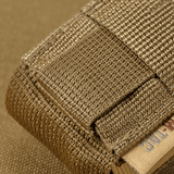 M-Tac Gasdåseholder Vertikal med MIL-SPEC strop og Woojin-lås for hurtig adgang til beskyttelsesudstyr.