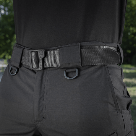 M-Tac Shorts Aggressor Gen.II Flex in black with tactical belt, close-up view highlighting durability and flexibility outdoors.