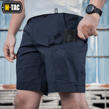 M-Tac Shorts Aggressor Short navy blå med taktiske lommer, ideel til varme dage og aktiv brug, fremstillet i elastisk polycotton material.
