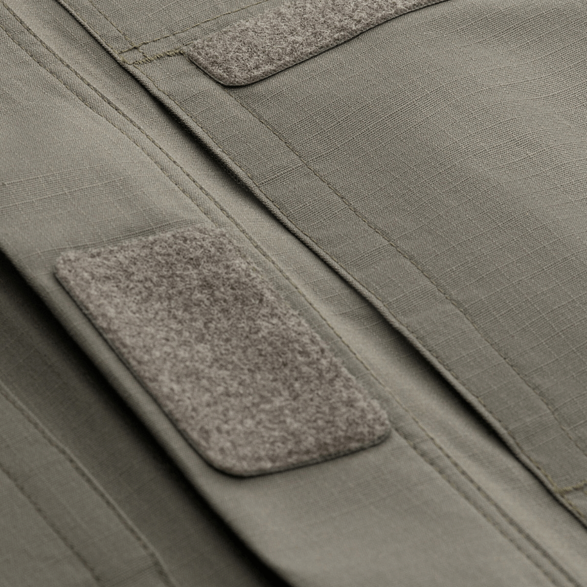 M-Tac Jakke Patrol Flex detaillering med velcro og YKK fittings, fremhæver taktisk og praktisk design for optimal brug.