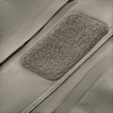 Detalje af velcro-panel på M-Tac Patrol Flex Jakke, der viser tekstur og design.