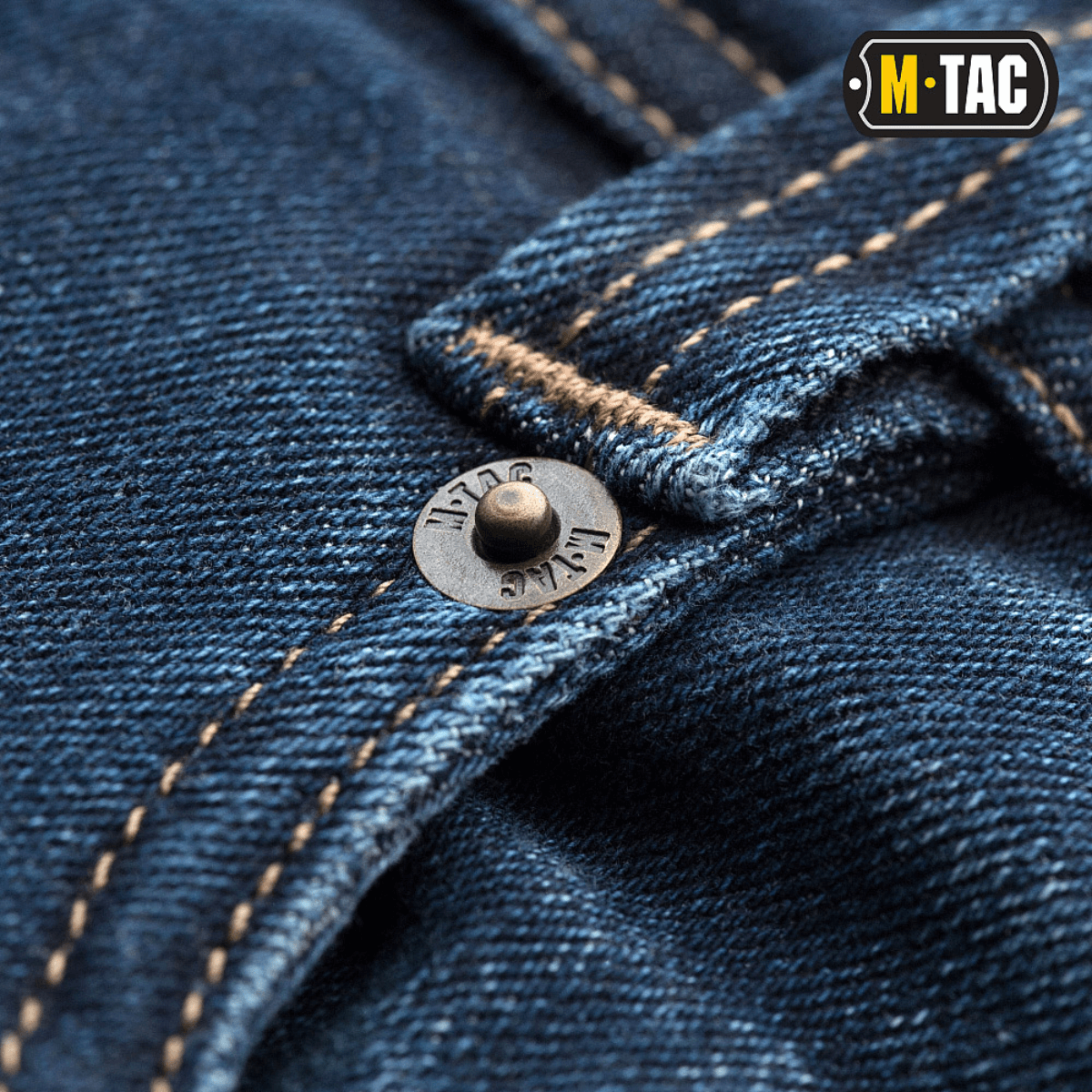 Nærbillede af M-Tac Tactical Gen.I Regular Fit jeans med detaljeret syning og knap.