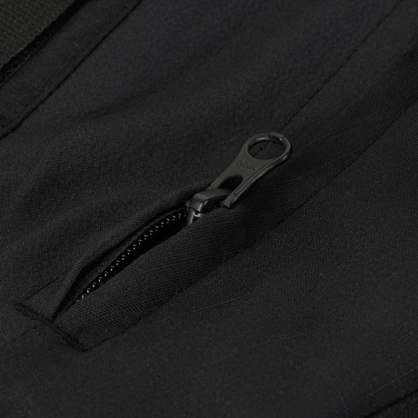 Nærbillede af lynlåsdetalje på M-Tac Bukser STURM NyCo Extreme Gen.II for holdbarhed og funktionalitet.