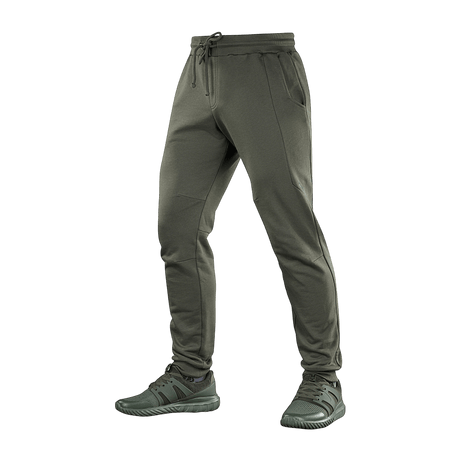 M-Tac Bukser Stealth Cotton, 100% bomuld, alsidige sportbukser, elastik talje, sidelommer, grøn farve, perfekt til løb og fitness.