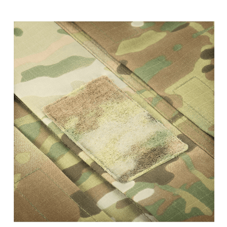 Tæt på M-Tac Bukser Army Gen. II NYCO Extreme med elastisk materiale og camouflageprint, fremstillet af holdbart NYCO Extreme-stof.