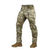 Multicam militærbukser med camouflagedesign og praktiske lommer, velegnet til udendørs brug og kampaktiviteter.