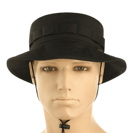 M-Tac Panama Rip-Stop army-hat med semi-stiv skygge og ventilationshuller, ideel til camouflageudstyr, set forfra på mannequin.