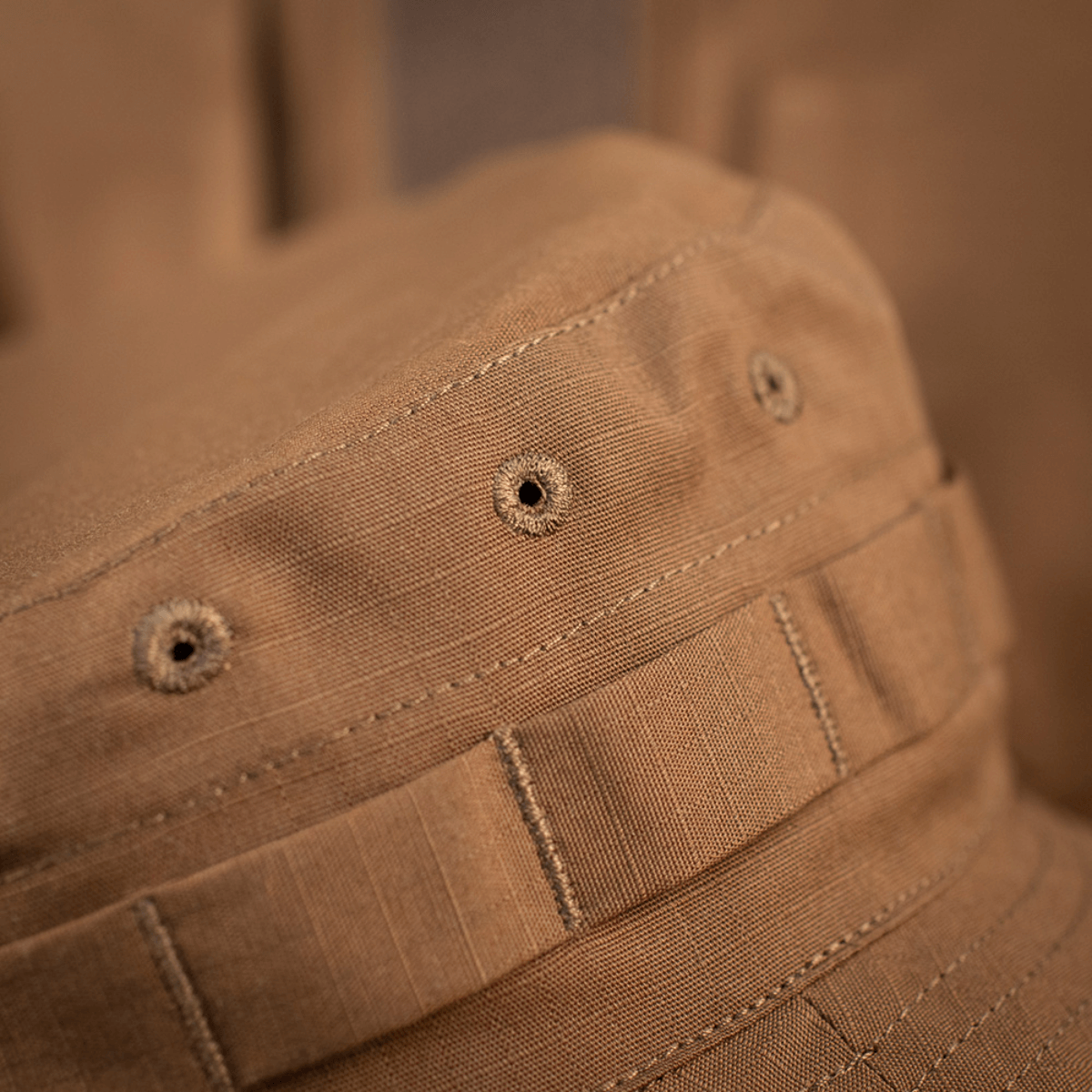 M-Tac Panama Rip-Stop army-hat med rip-stop materiale. Semi-stiv skygge, ventilationshuller og kamouflagebånd. Optimal åndbarhed, 63% bomuld.