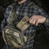 Person holding M-Tac Pung Elite Gen.II in camouflage setting