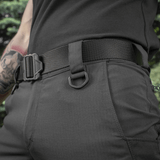 Person wearing M-Tac Aggressor Summer Flex Shorts with elastic tunnel waist and D-ring details, ideal for tactical use.