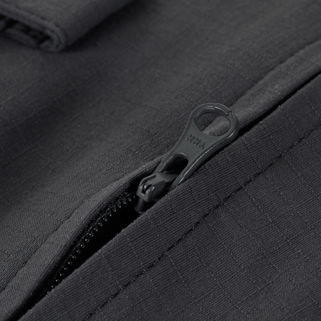 Nærbillede af lynlåsdetalje på M-Tac Aggressor Summer Flex Shorts i Flex Rip-Stop stof.