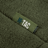 M-Tac Combat Fleece Polartec Jakke logo på grøn fleece stof.