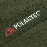 M-Tac Combat Fleece Polartec Jakke stofdetalje med Polartec® logo i nærbillede.
