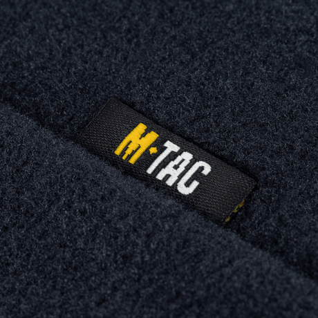 M-Tac Sweater Nord Fleece Polartec Dame close-up af brandlabel på blød og varm Polartec® 200 Series fleece materiale.