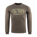 M-Tac Raglan Logo trøje med camouflage logo og slogan på ærme. 95% bomuld, 5% elastan, komfortabel pasform, grøn farve.