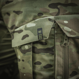 M-Tac Shorts STURM Gen.II Nyco Extreme i camouflage-look med forstærkninger, ideel til taktisk brug og outdoor aktiviteter. Fokus på detaljeret syning.