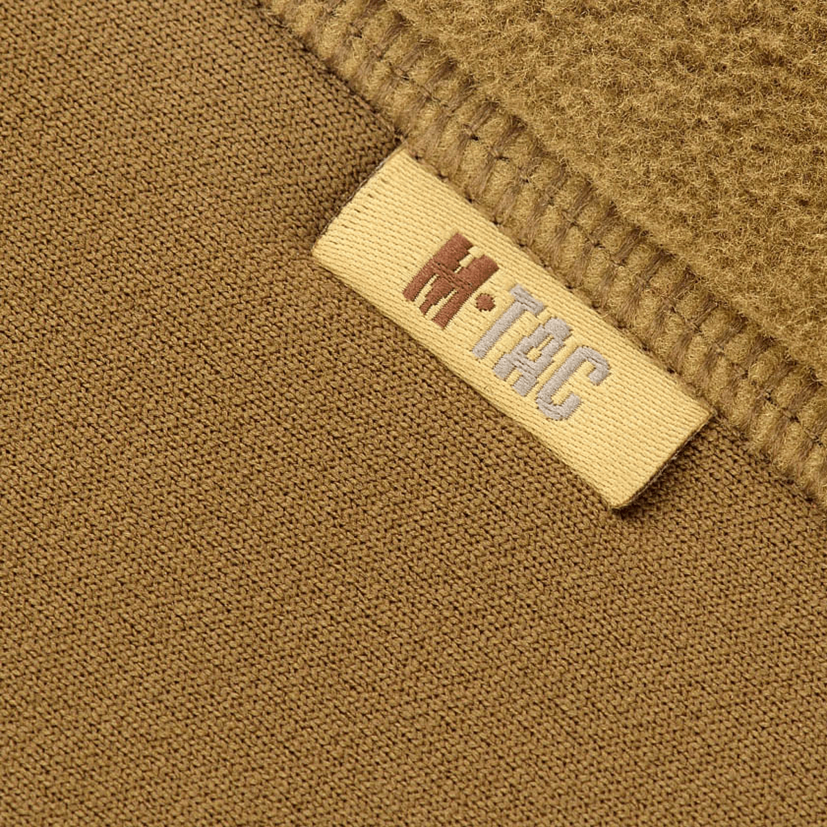 M-Tac Polartec Sport Fleecejakke detalje af stof og mærke