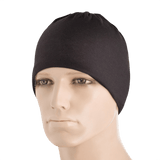 Mand iført M-Tac Let Tubehalstørklæde Reaper Skull som hue. Multifunktionelt tilbehør til sport og daglig brug.