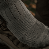 Taktiske M-Tac Sokker Tactical Army for mænd, designet til komfort og holdbarhed, ideel til hverdagsbrug og ture.