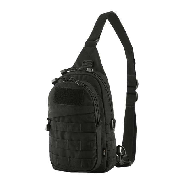 M-Tac Assistant Taske i sort med justerbar sele og MOLLE-paneler til alsidig brug. Praktisk kompakt rygsæk til dagligdagen.