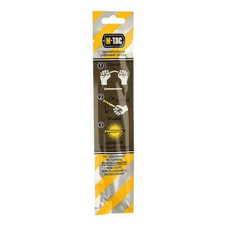 M-Tac Glow Stick 15 cm i emballage, viser instruktioner til brug, egnet til mørke områder, ikke-giftig og lang holdbarhed.