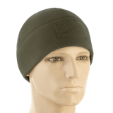 M-Tac Watch Cap Elite Fleece Beanie Hat Velcro på mannequin, varm hue til taktisk brug og friluftsliv med velcro-panel til mærker.