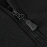 Nærbillede af lynlås på M-Tac Thermal Fleece Shirt Delta Level 2 Lady, fremstillet af varmebevarende polyester materiale.